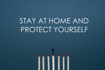 Maintain a distance between you and other people. Social distancing concept using burnt out match sticks as a metaphor for containing coronavirus or any virus or pandemic outbreak. Stay at home