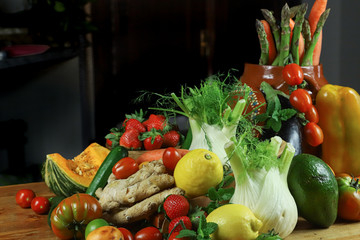 
closeup of mixed fruit and vegetables with black background