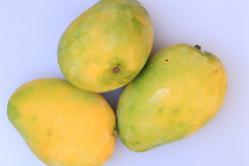 Fresh Yellow Mango fruit slice isolated on white background

