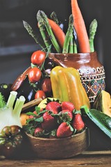 closeup of a rustic composition of fruit and vegetables