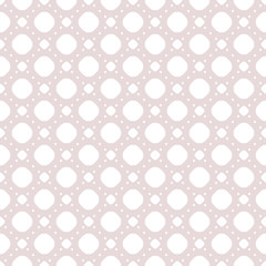Cute vintage seamless pattern in trendy pastel colors, pale pink and white. Minimal abstract background with small circles, dots in square grid. Subtle repeat fashionable texture. Perforated surface
