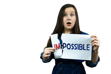 positivity concept, woman tearing word impossible to make possible