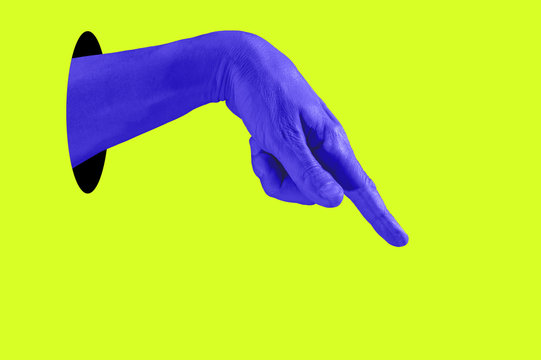 Fototapeta Hand in a pop art collage style in neon bold colors. Modern psychedelic creative element with human palm for posters, banners, wallpaper. Copy space for text. Magazine style template. Zine culture.