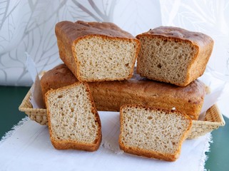 Tasty homemade loaf and slices of bread