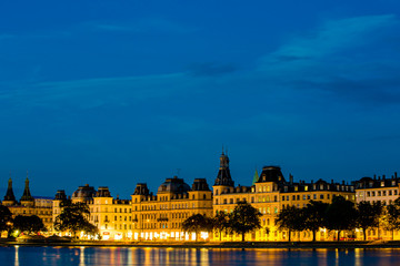 Fototapeta na wymiar Twilight view of old historical buildings in Copenhagen over the water