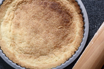 Freshly Baked Tart Base in Tin. Making Boston Banoffee Pie.