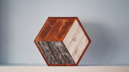 Decorative wooden wall coating hexagon shape in the color of various trees. Interior wooden design...