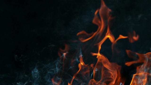 Super slow motion of flames isolated on black background. Filmed on high speed cinema camera, 1000 fps