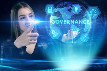 Business, Technology, Internet and network concept. Young businessman working on a virtual screen of the future and sees the inscription: Governance