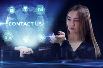 Business, Technology, Internet and network concept. Young businessman working on a virtual screen of the future and sees the inscription: Contact us