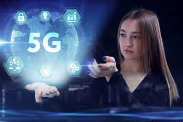 Business, Technology, Internet and network concept. Young businessman working on a virtual screen of the future and sees the inscription: 5G