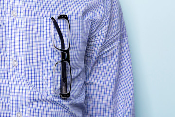 Glasses are in the shirt pocket, man
