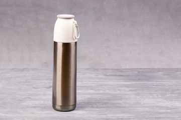 Thermos for tea or coffee with mug