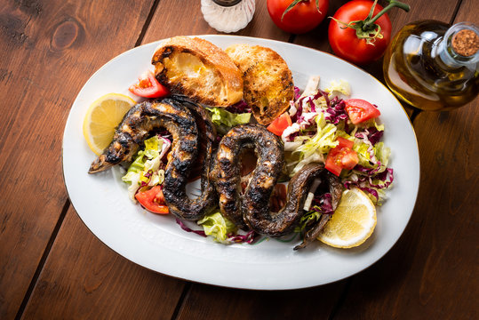 Piatto di anguille arrosto, Cucina tipica Sarda