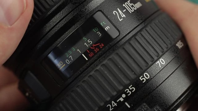 Changing the focal length on the camera's lens. Focus ring close up
