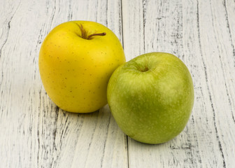 apples on wooden table