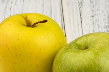 apples on a wooden table