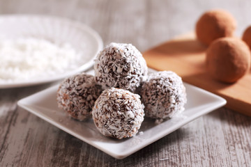 Natural healthy sweets made from dates, nuts, cocoa and coconut. Healthy food. Eastern sweets