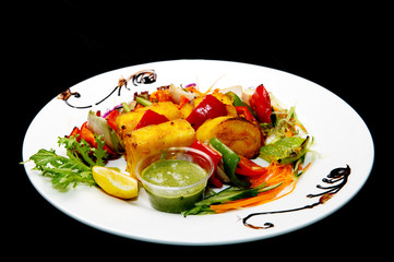 Grilled potato with capsicum and onion