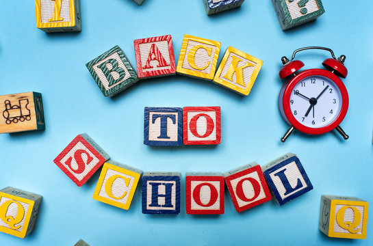Back to school note written with wooden letters