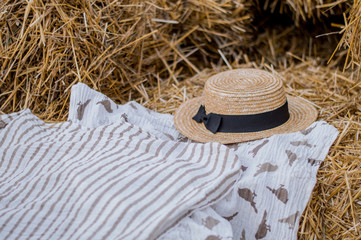 straw hat on a cloth