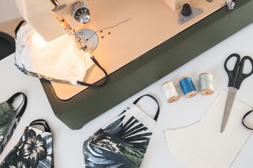 protective mask sewing Making homemade breathing mask, corona virus protection. home workplace of sewing