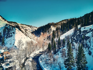Panoramic aerial view: beautiful spring landscape: the Ulba river in Kazakhstan wakes up from...