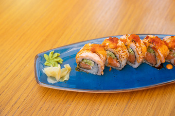 Fototapeta na wymiar salmon sushi roll - japanese food style
