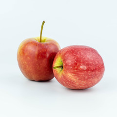 Fototapeta na wymiar Two red Apples fruit isolated on white background with clipping path.