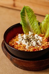Ground chicken mince saute with herbs and capsicum on a pastry puff. Authentic Mediterranean cuisine photography concept.
