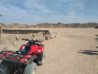 A vehicle for racing in the desert. Tours on the desert on Quad bikes. ATV safaris.
