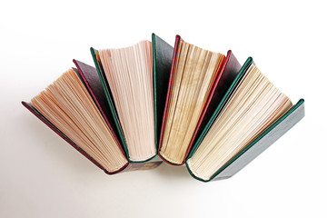 Book stack on a white background with bookmarks on classic, vintage style