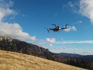 Fototapeta na wymiar drone ready to fly over a mountain