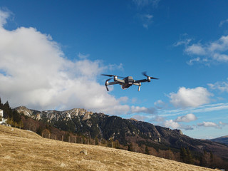 Fototapeta na wymiar drone ready to fly over a mountain