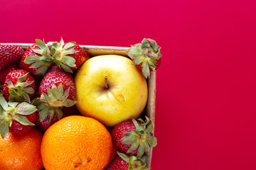Healthy tasty food. The most delicious and juicy fruits. Strawberries, oranges, tangerines, apples...