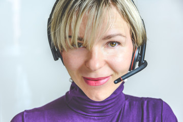 pretty young woman with headset telephone