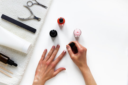 Do Female Manicure By Yourself While Staying At Home During Quarantine, Staying Safe. Top View, Flat Lay, Copy Space. Step By Step Instruction. Step 1 Apply Base Coat