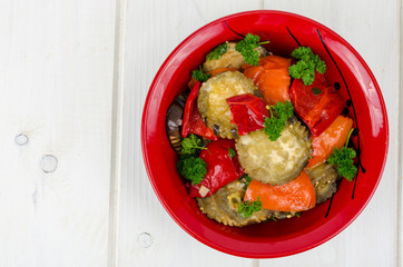 Vegetable saute with eggplant in red plate, vegetarian food