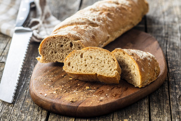 Fresh whole grain bread baguette.