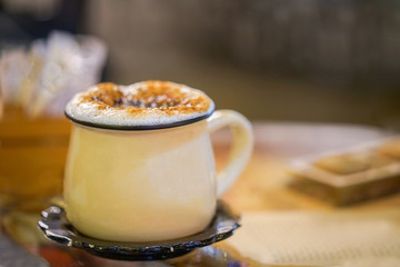 Sahlep in a mug made with plenty of foam