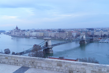 Naklejka premium Evening view upon Budapest. The Chain Bridge, Palace of Parliament and Danube river are just the perfect trio