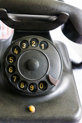 old telephone with dial disk from german democratic republic
