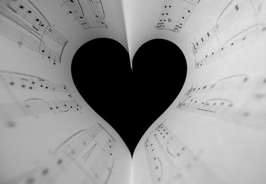 Heart music notes. The black and white concept of the love of music. Foreground soft focus.