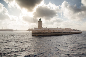 Fototapeta premium protective pier with a lighthouse