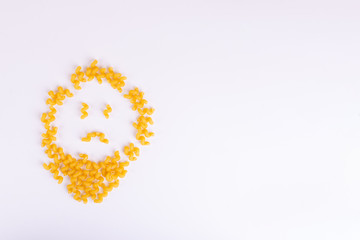 sad macaroni emoji on white with free space 