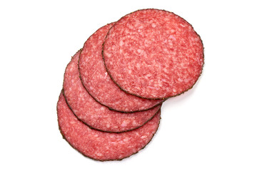 Thinly Sliced Milano salami, isolated on white background