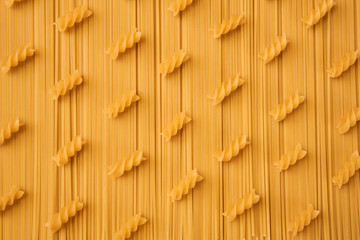 background of dried pasta, spaghetti and spiral