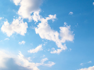 Fantastic soft white clouds against blue sky