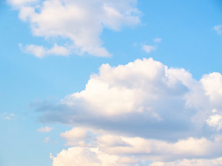 Fantastic soft white clouds against blue sky