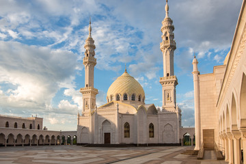 Fototapeta na wymiar Beautiful white mosque in the city of Bolgar on the background of a beautiful blue sky